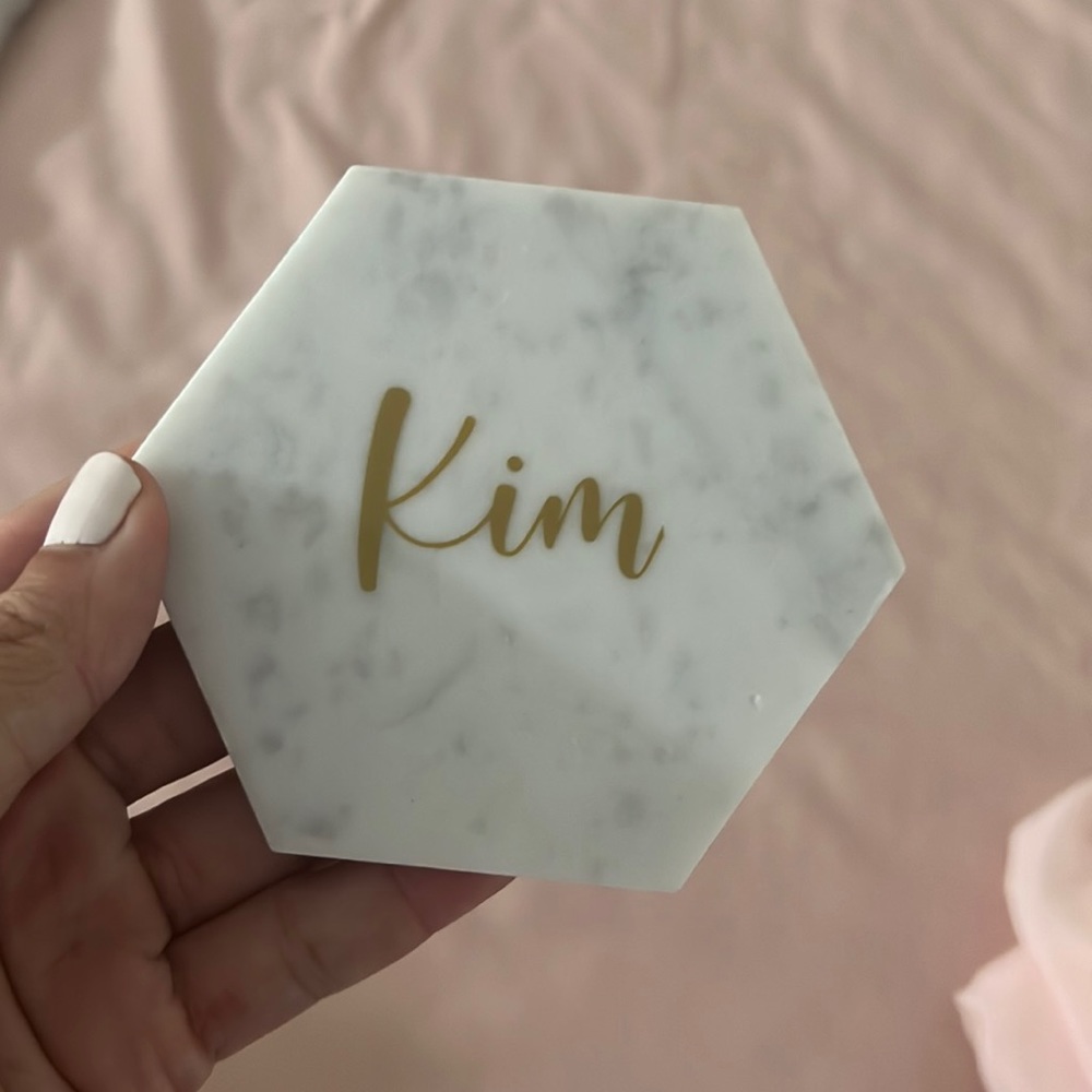 Brand new coaster labeled Kim